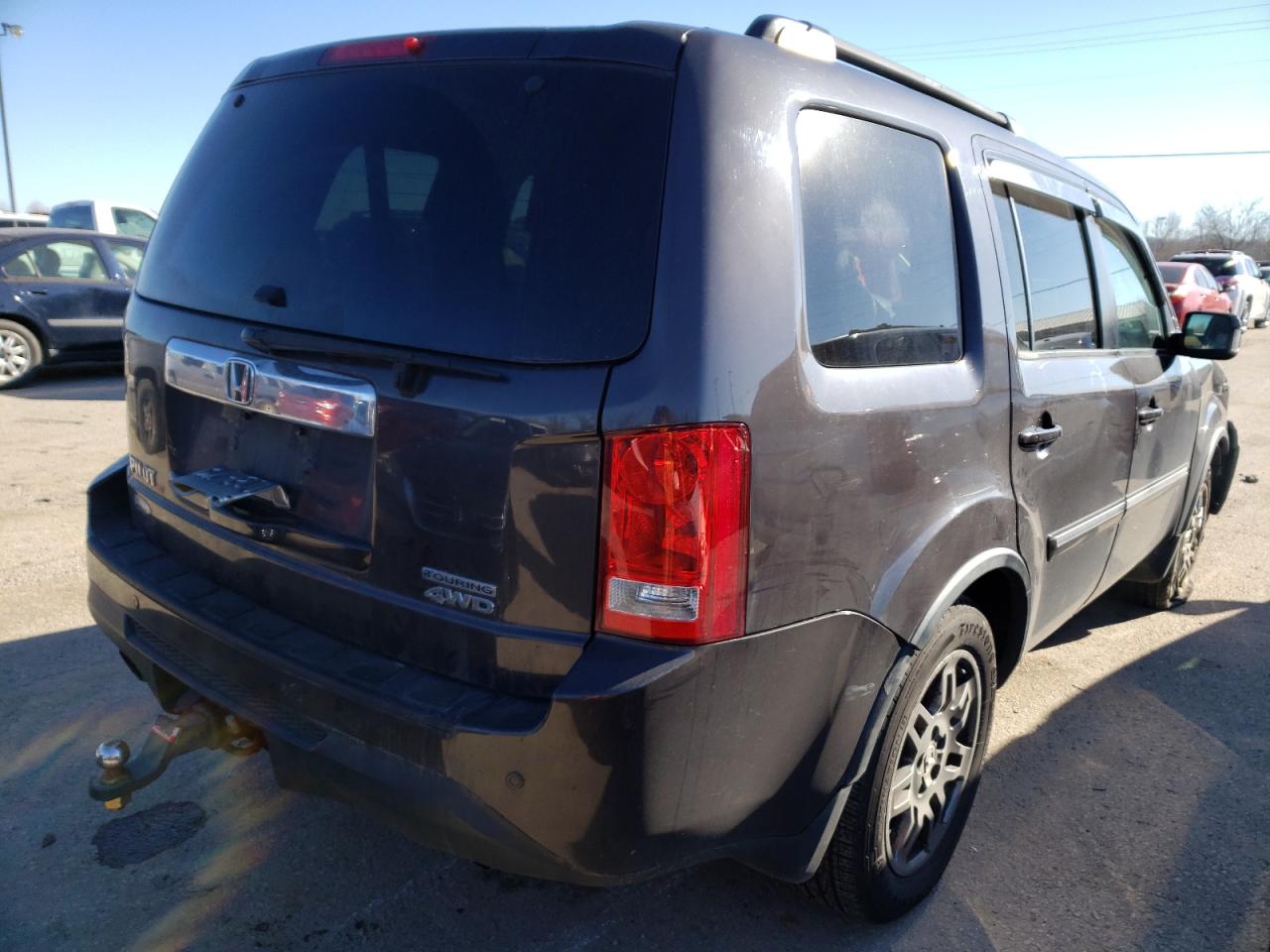 Photo 4 from auction – 2013 HONDA PILOT TOUR with VIN 5FNYF4H98DB026316