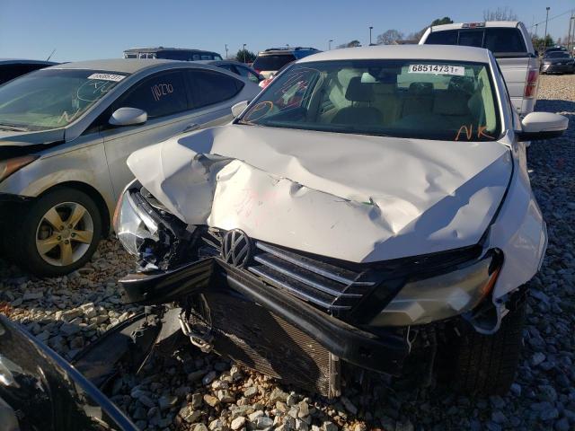 Photo 7 from auction – 2015 VOLKSWAGEN PASSAT S with VIN 1VWAT7A35FC114660