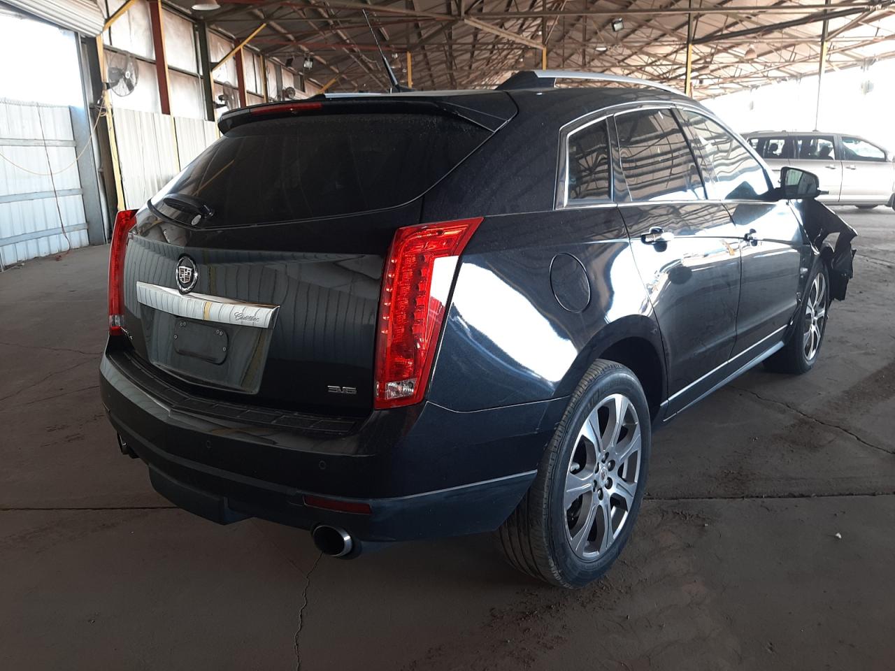 Photo 4 from auction – 2012 CADILLAC SRX PREMIU with VIN 3GYFNFE33CS531198
