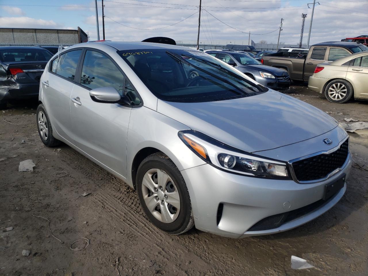 KIA FORTE LX 2017 with VIN 3KPFK4A70HE157490 - Photo from auction