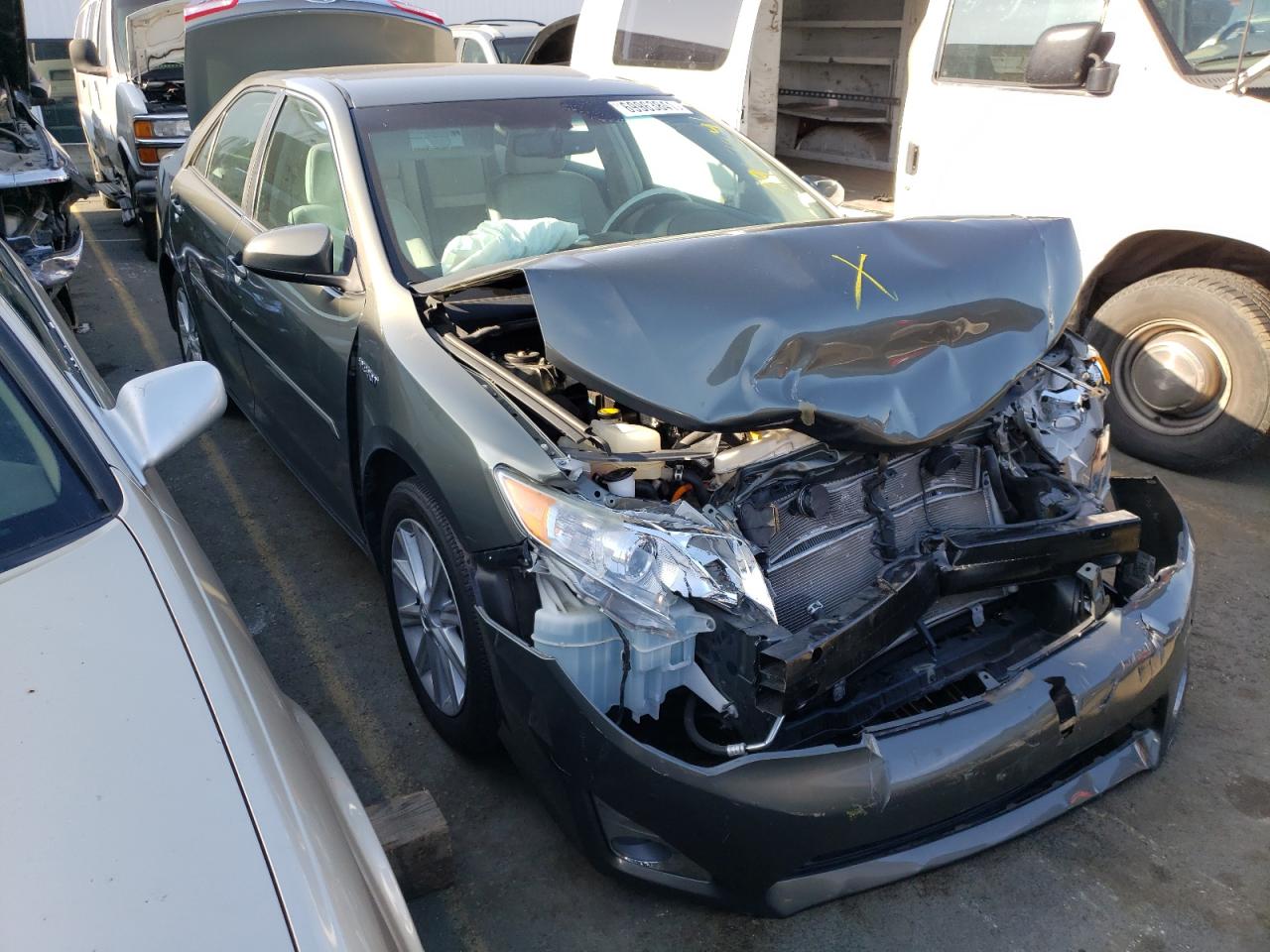 TOYOTA CAMRY HYBR 2014 with VIN 4T1BD1FK2EU103444 - Photo from auction