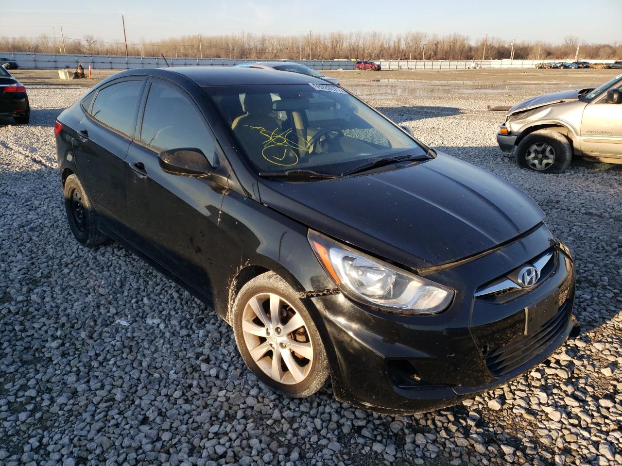 HYUNDAI ACCENT 2012 with VIN KMHCU4AE8CU041018 - Photo from auction