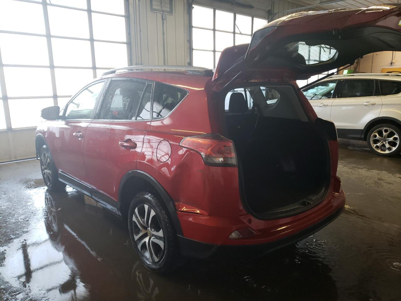Photo 3 from auction – 2017 TOYOTA RAV4 LE with VIN JTMBFREV0HJ131922