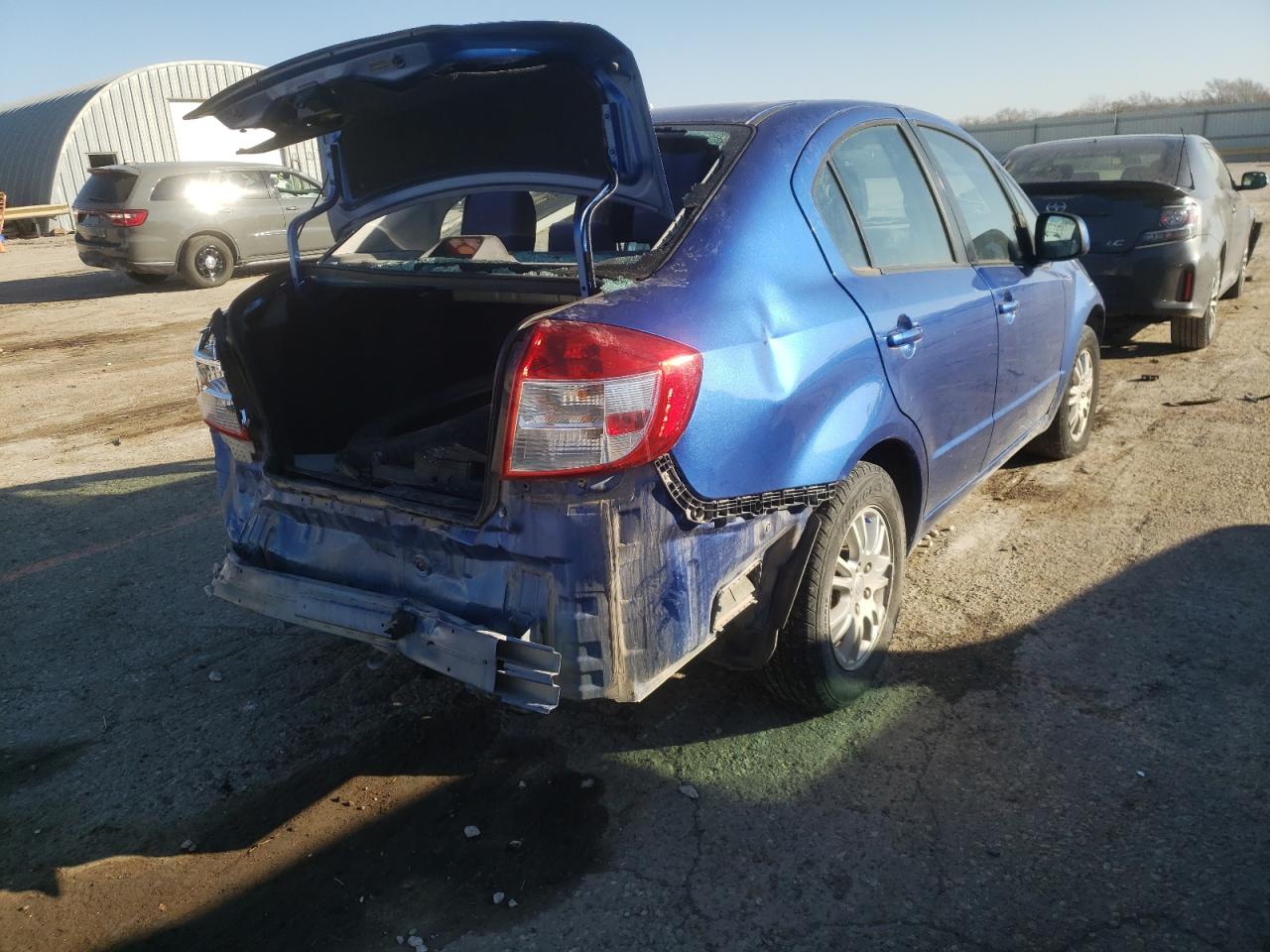 Photo 4 from auction – 2013 SUZUKI SX4 LE with VIN JS2YC5A3XD6100566