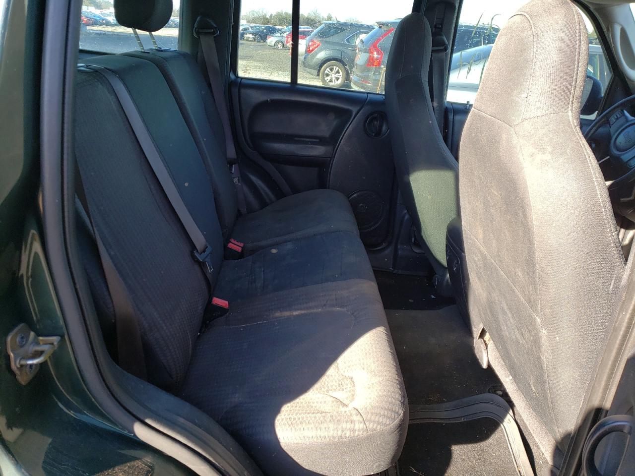 Photo 6 from auction – 2003 JEEP LIBERTY SP with VIN 1J4GL48K03W511402