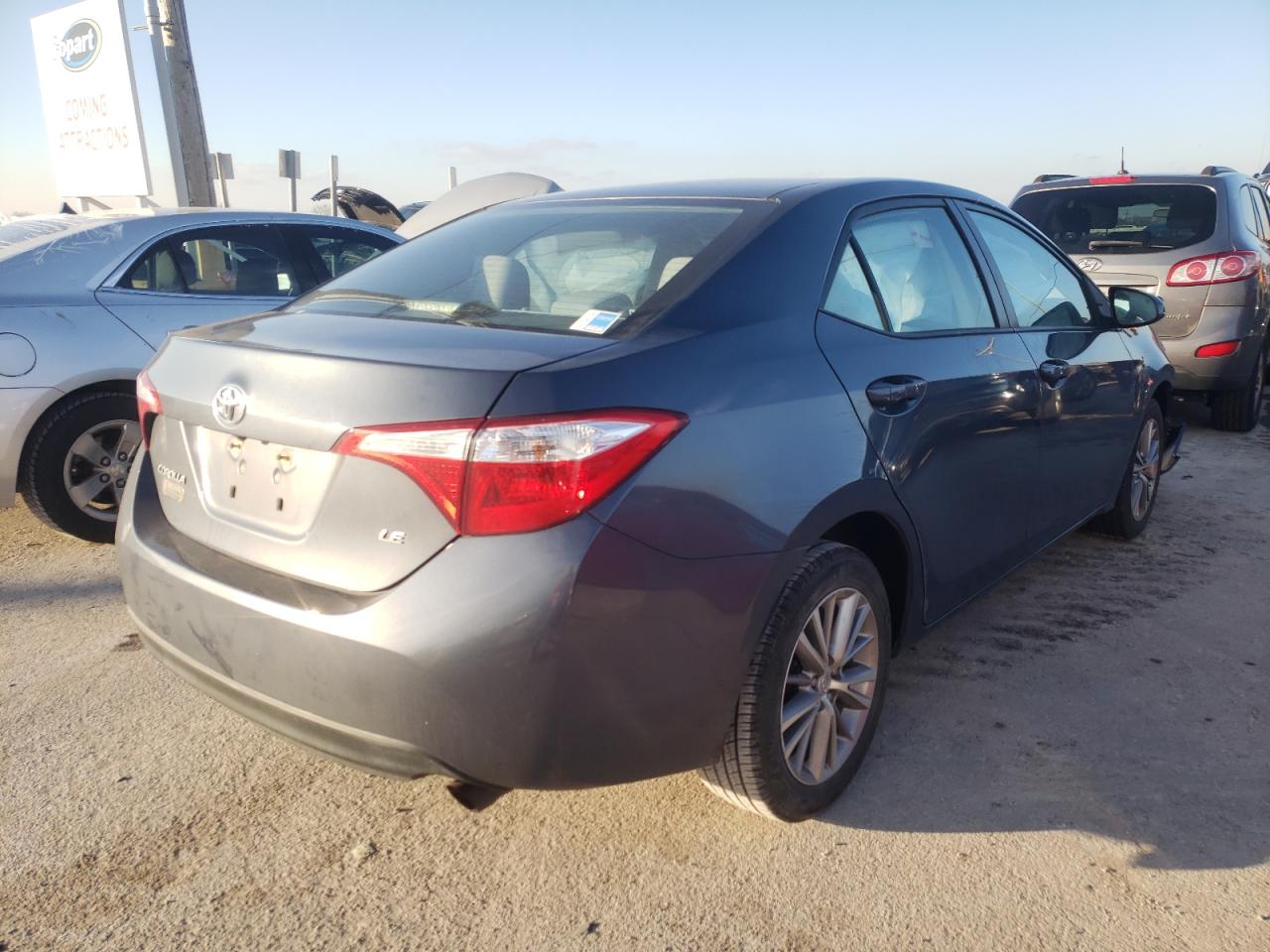 Photo 4 from auction – 2014 TOYOTA COROLLA L with VIN 5YFBURHE4EP067764
