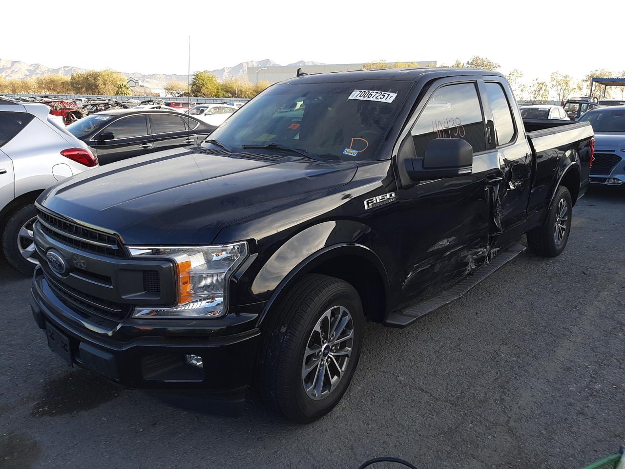 Photo 2 from auction – 2018 FORD F150 SUPER with VIN 1FTEX1CG0JKD66112