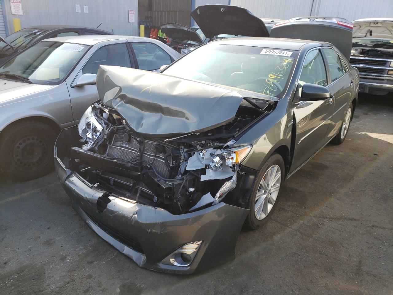 Photo 2 from auction – 2014 TOYOTA CAMRY HYBR with VIN 4T1BD1FK2EU103444
