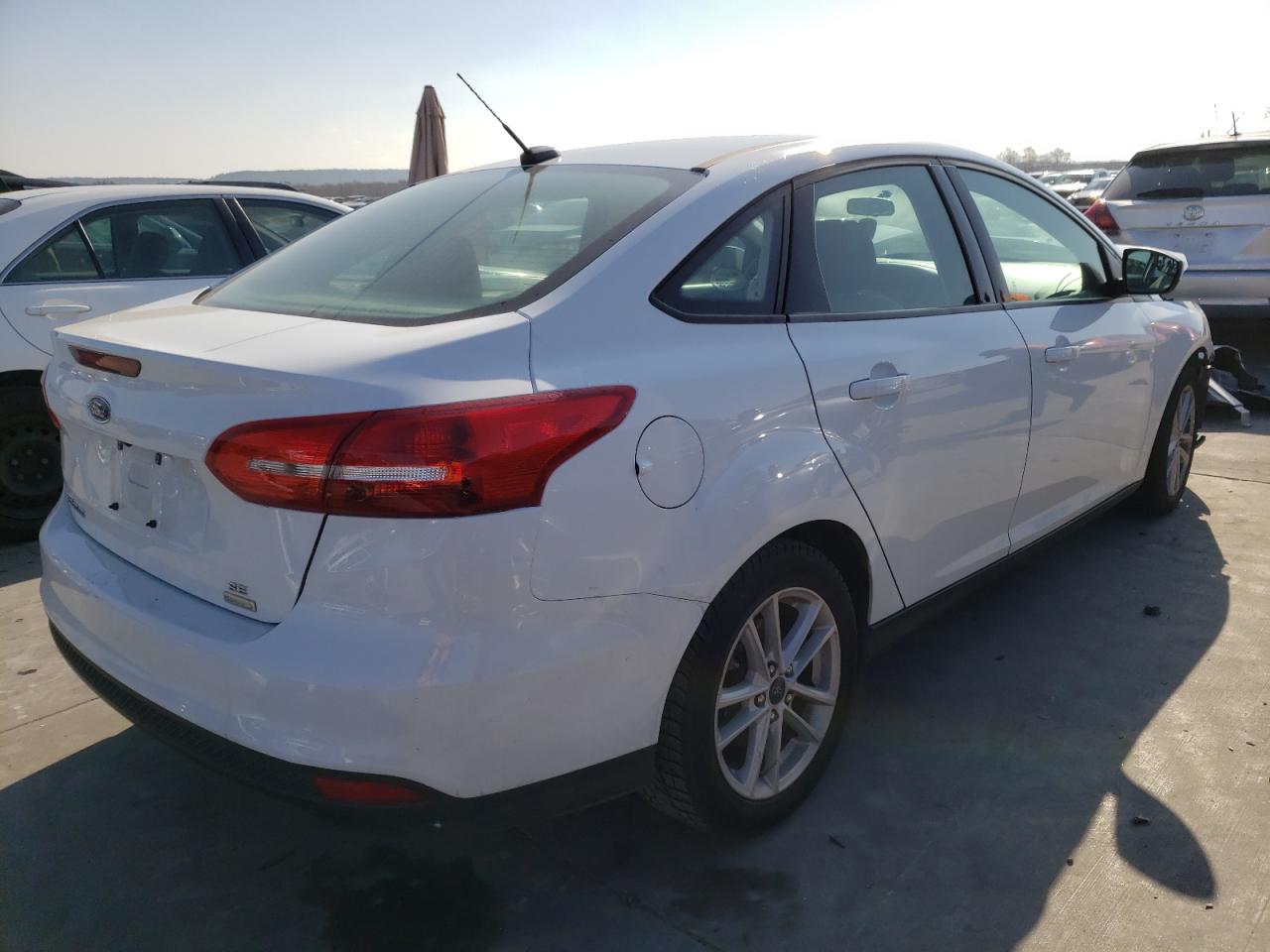 Foto 4 de la subasta – 2018 FORD FOCUS SE con VIN 1FADP3FE6JL210612