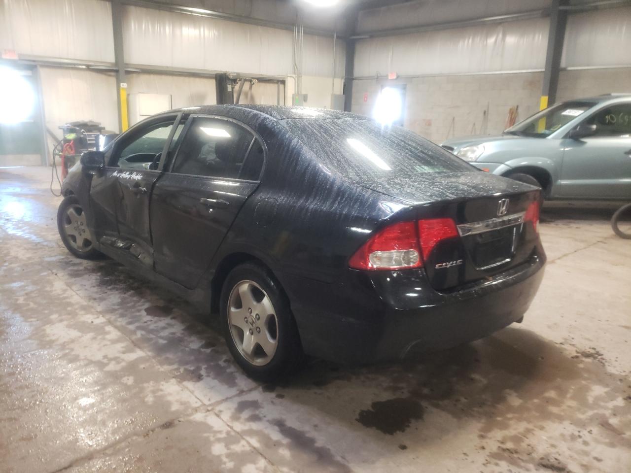 Photo 3 from auction – 2011 HONDA CIVIC LX with VIN 19XFA1F53BE048277