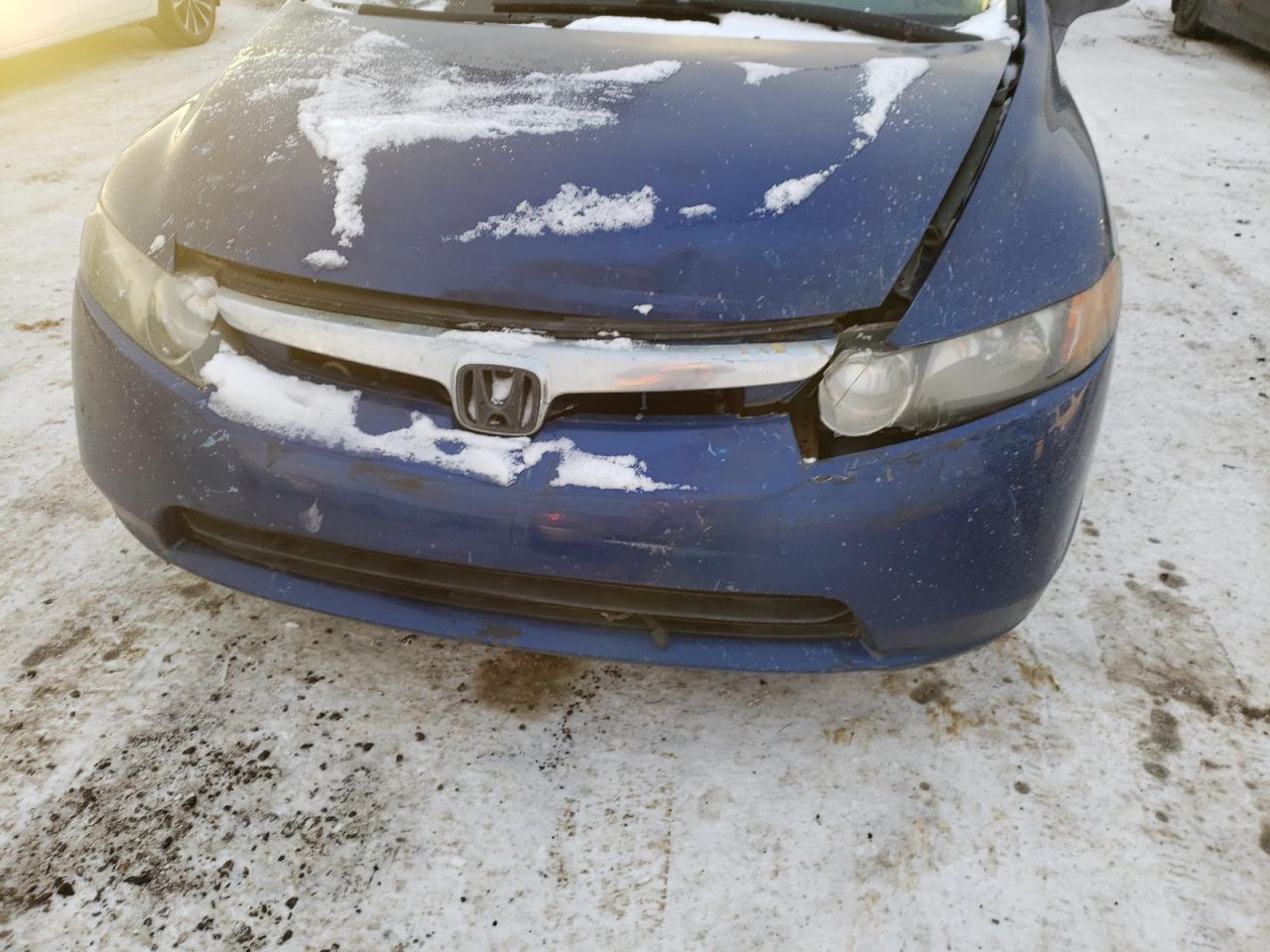 Photo 9 from auction – 2005 HONDA CIVIC LX with VIN 2HGFA16537H025448