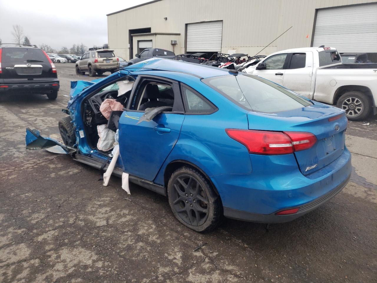 Photo 3 from auction – 2016 FORD FOCUS SE with VIN 1FADP3F21GL301799