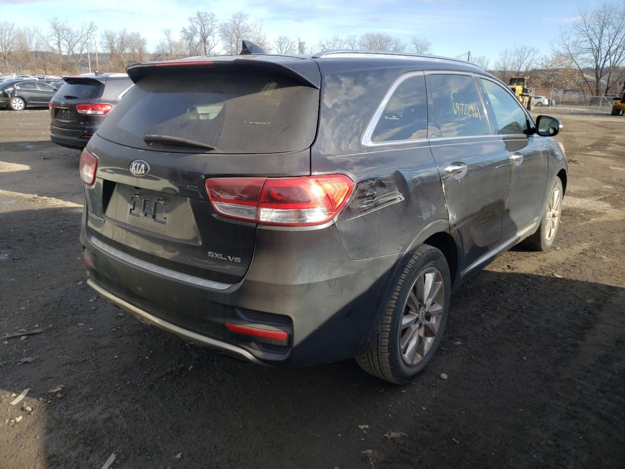 Photo 4 from auction – 2016 KIA SORENTO SX with VIN 5XYPKDA52GG090587