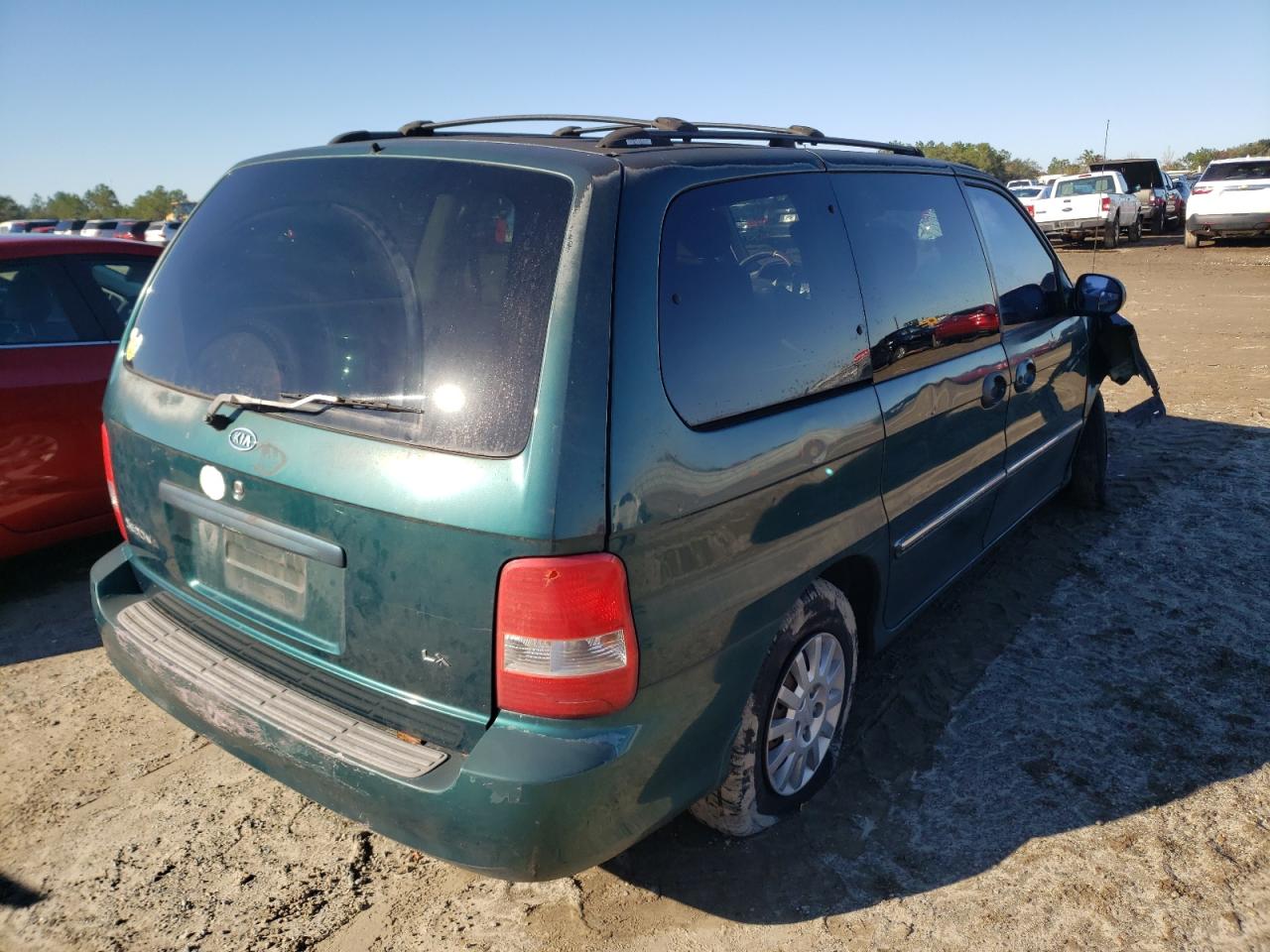 Photo 4 from auction – 2003 KIA SEDONA EX with VIN KNDUP131836434532