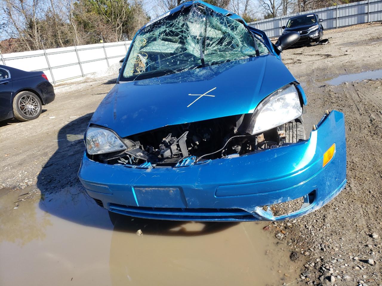 Photo 10 from auction – 2007 FORD FOCUS ZX4 with VIN 1FAFP34N87W347344