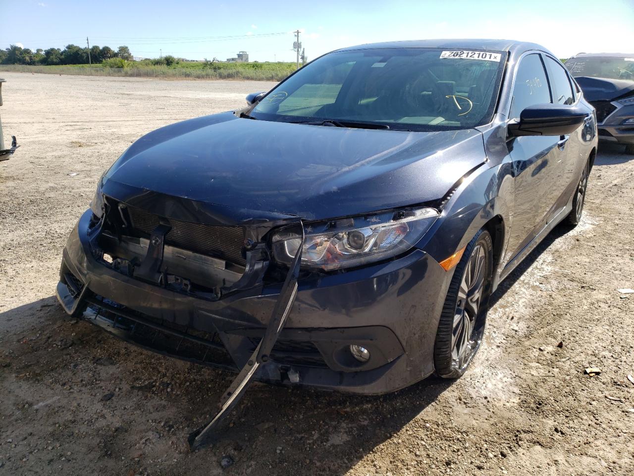 Photo 2 from auction – 2018 HONDA CIVIC EX with VIN JHMFC1F36JX032225