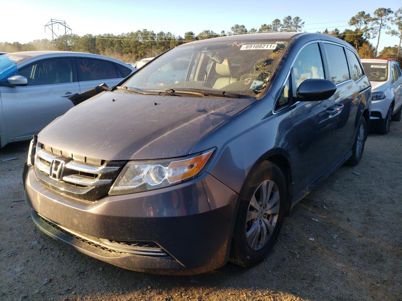 Photo 2 from auction – 2015 HONDA ODYSSEY EX with VIN 5FNRL5H62FB104584