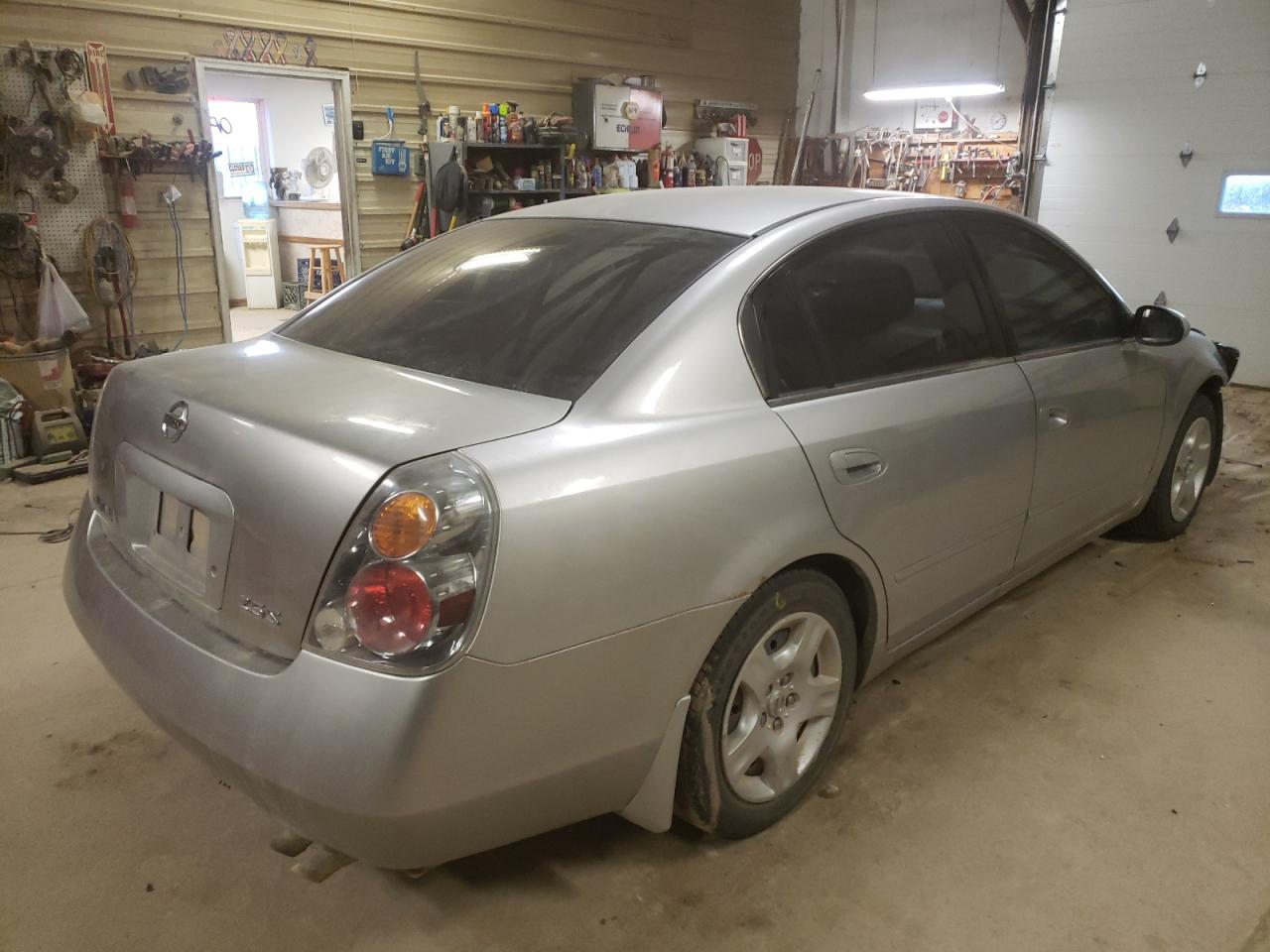 Photo 4 from auction – 2003 NISSAN ALTIMA with VIN 1N4AL11D13C180973