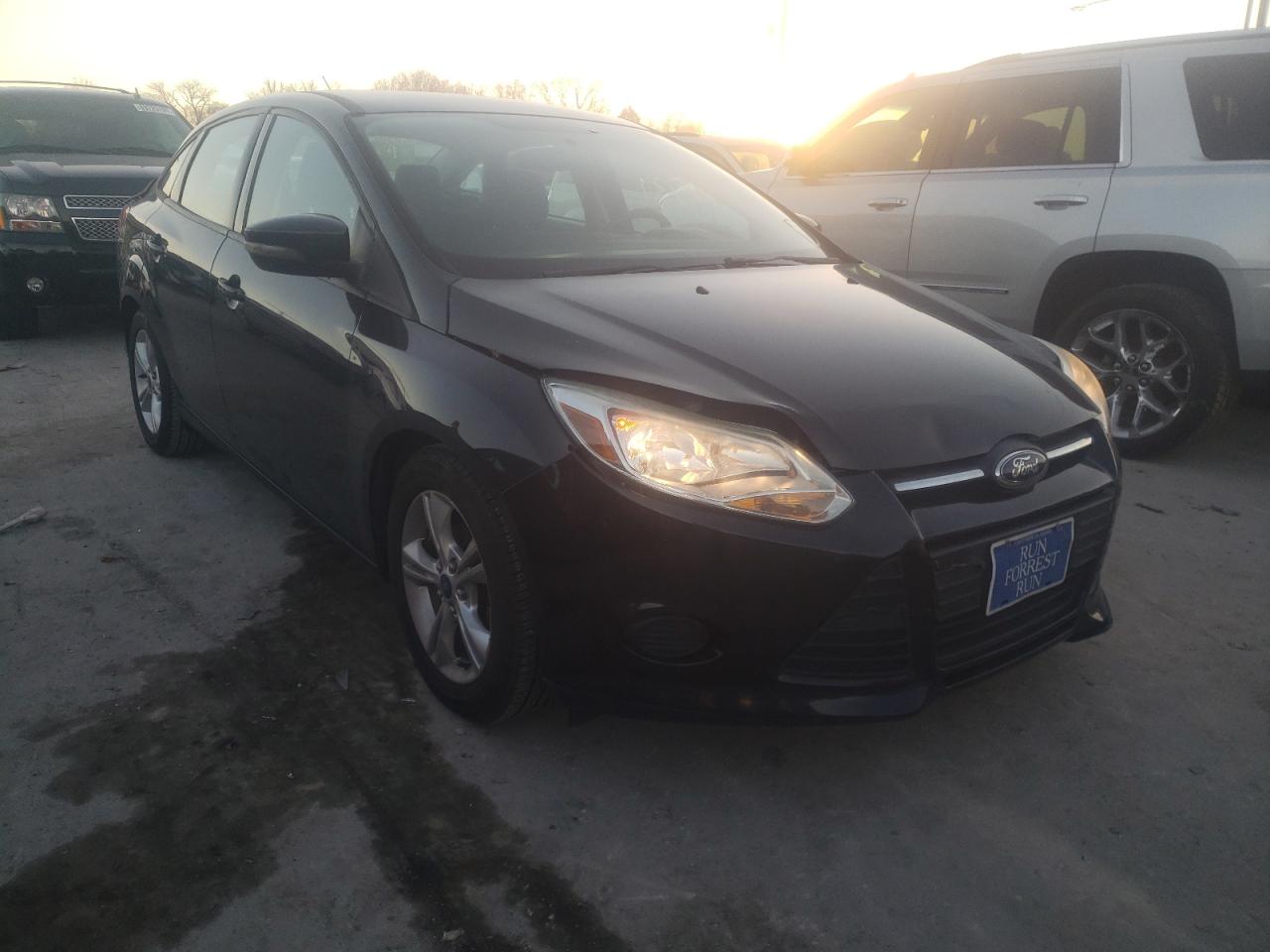 FORD FOCUS SE 2014 with VIN 1FADP3F28EL180038 - Photo from auction