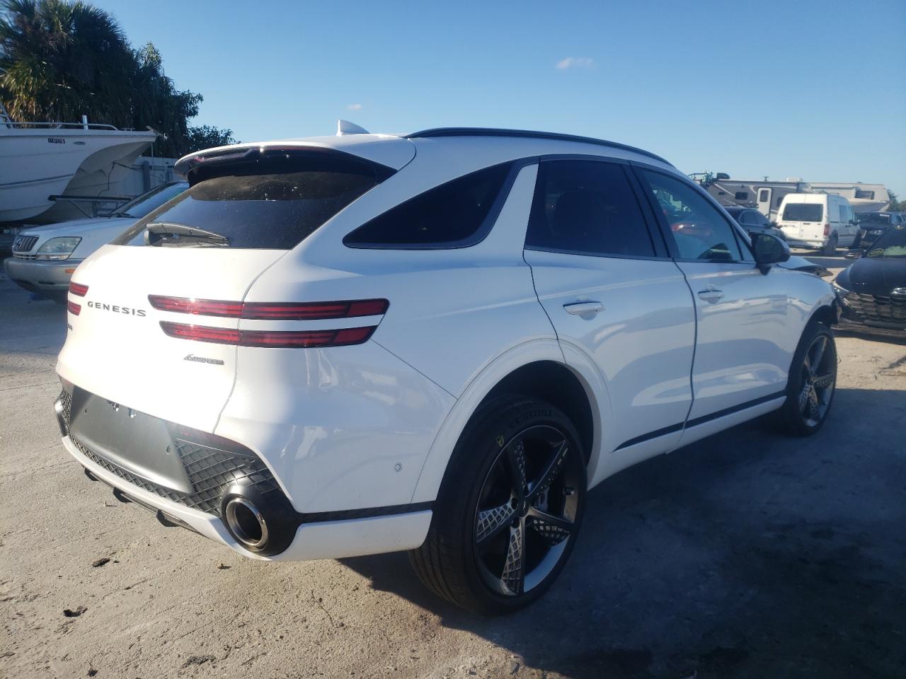 Photo 4 from auction – 2022 GENESIS GV70 BASE with VIN KMUMCDTC4NU042349