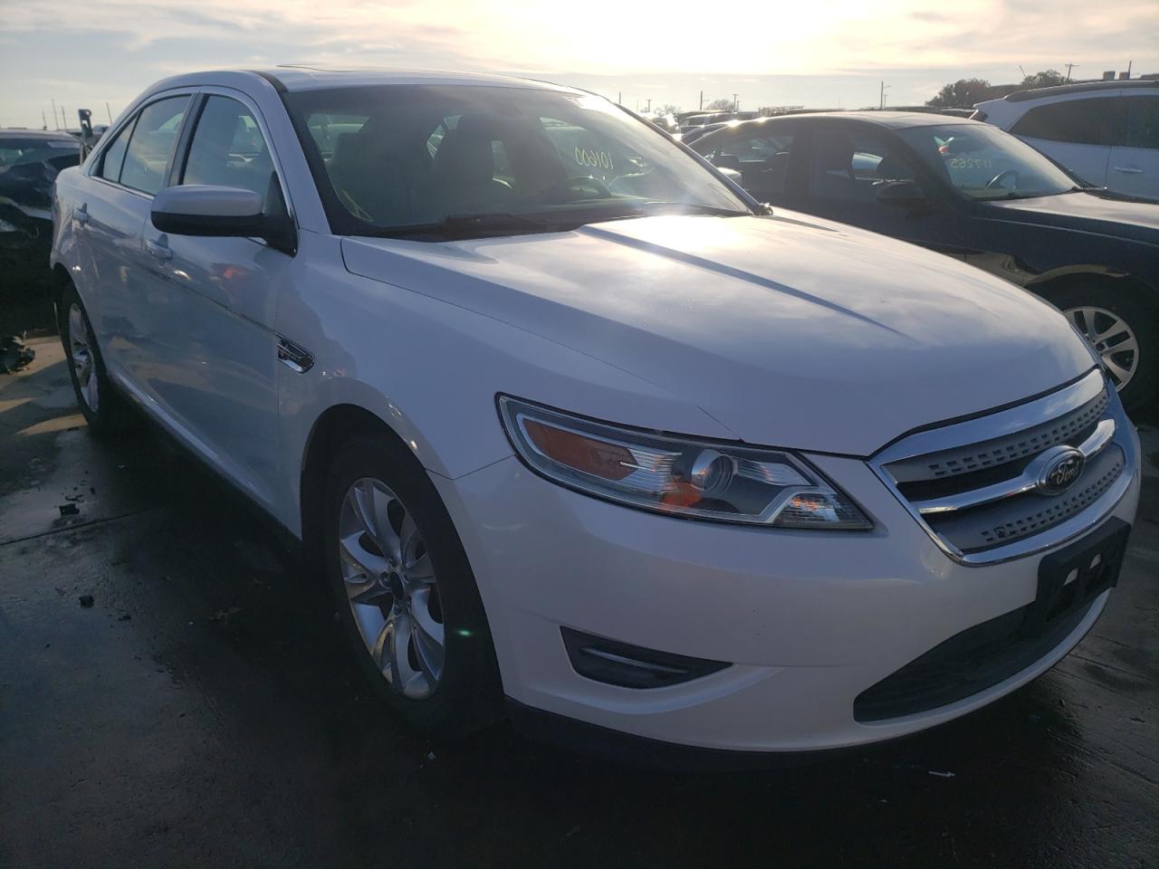 FORD TAURUS SEL 2012 with VIN 1FAHP2EW0CG143359 - Photo from auction