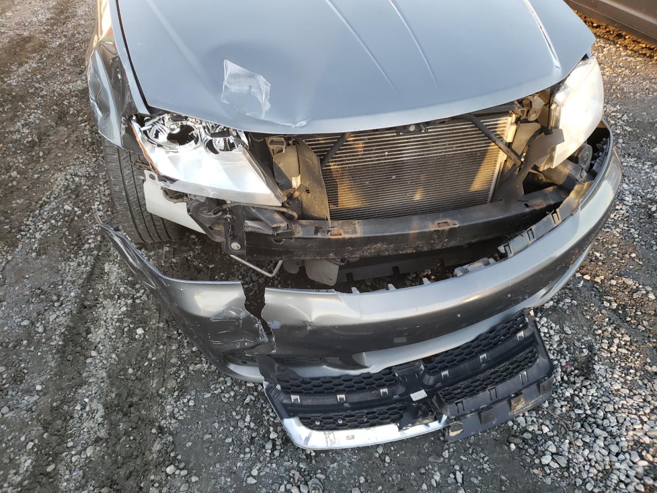 Photo 9 from auction – 2012 DODGE AVENGER SE with VIN 1C3CDZAB9CN231349