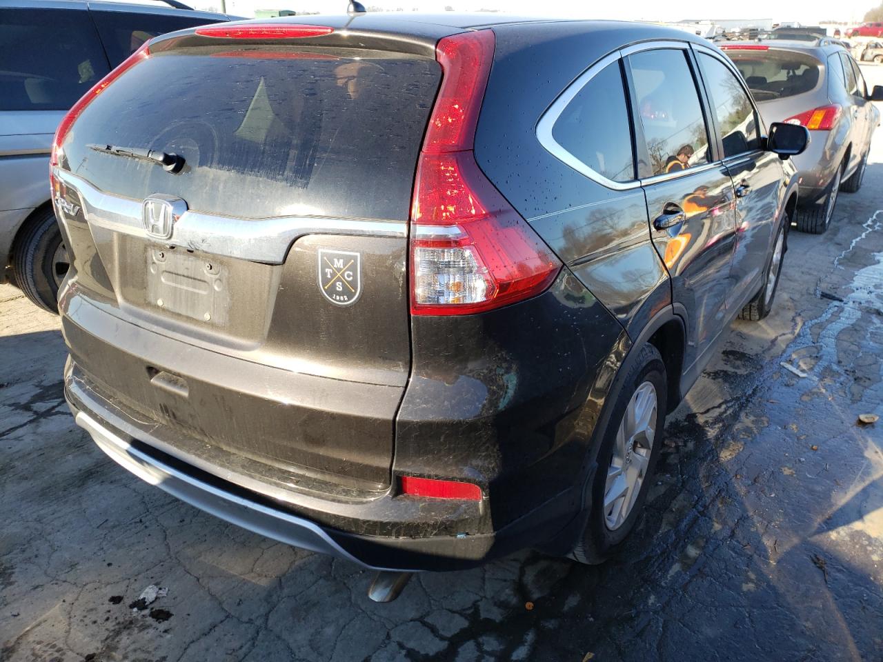 Photo 4 from auction – 2015 HONDA CR-V EX with VIN 2HKRM3H55FH540419