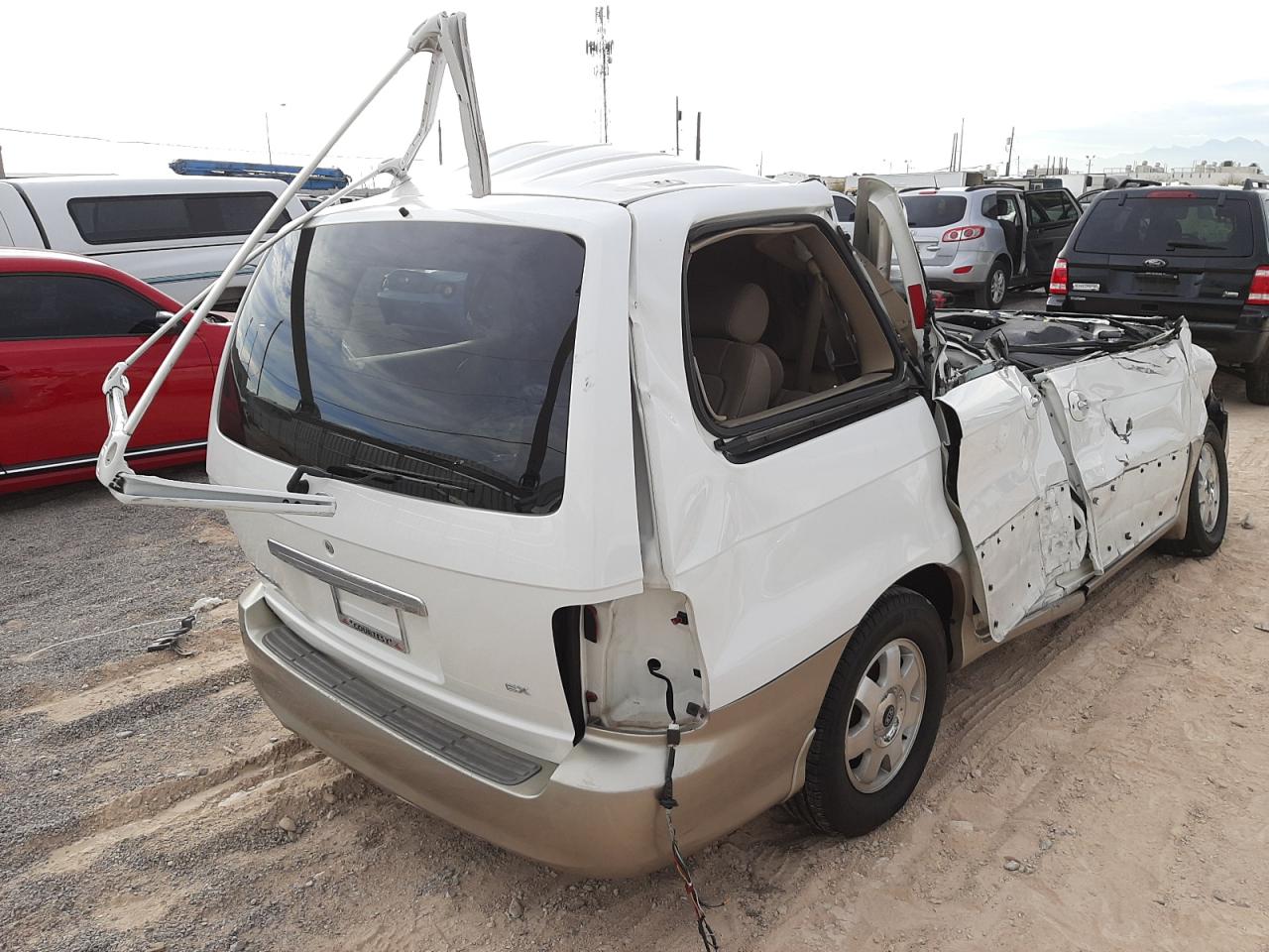 Photo 4 from auction – 2003 KIA SEDONA EX with VIN KNDUP131336438293
