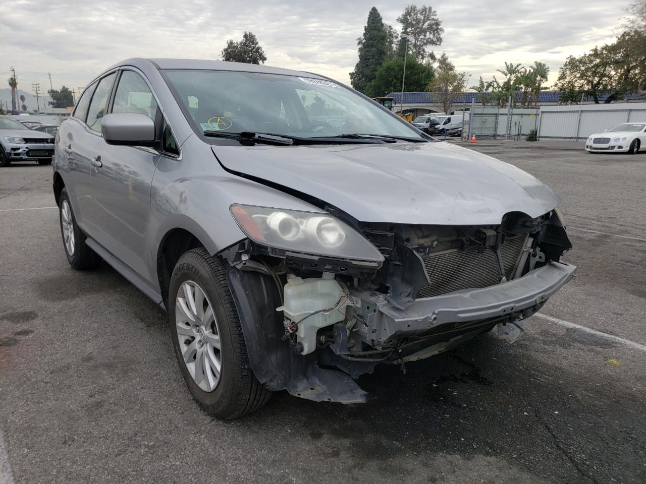 MAZDA CX-7 2011 with VIN JM3ER2AM4B0386599 - Photo from auction