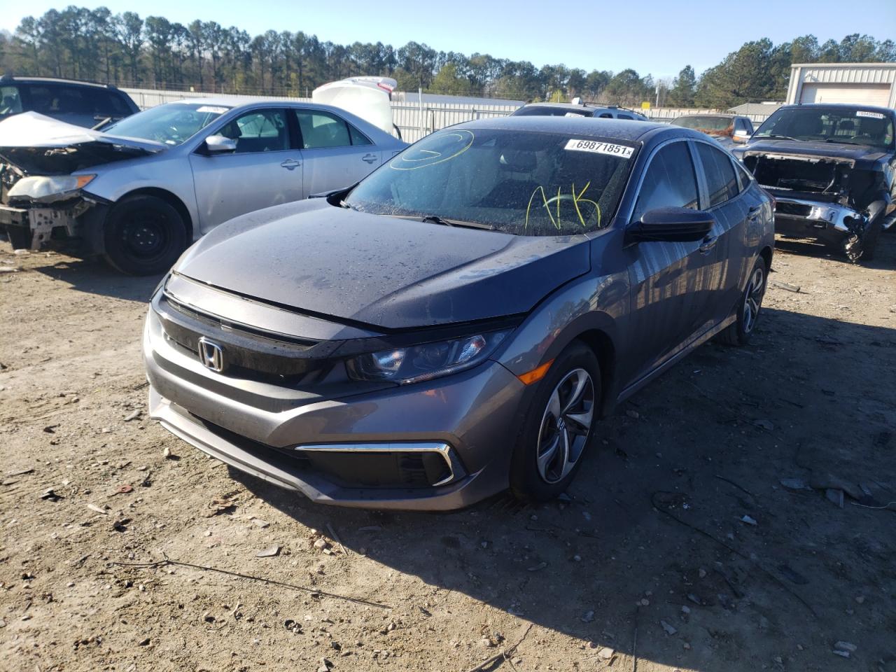 Photo 2 from auction – 2019 HONDA CIVIC LX with VIN 19XFC2F67KE019275