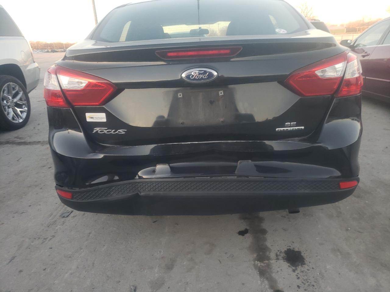 Photo 9 from auction – 2014 FORD FOCUS SE with VIN 1FADP3F28EL180038