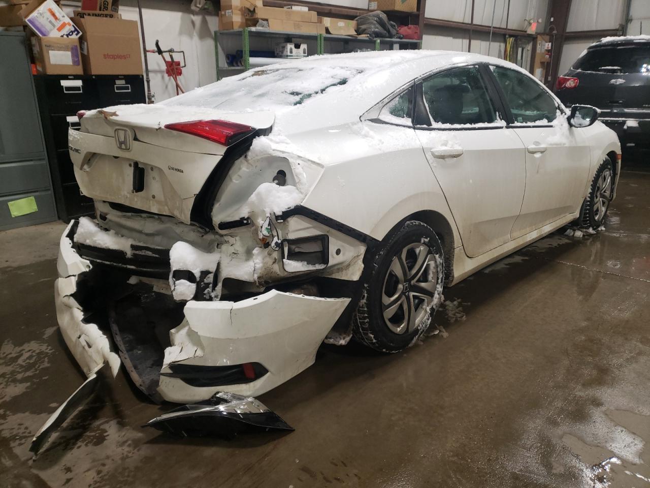 Photo 4 from auction – 2017 HONDA CIVIC LX with VIN 2HGFC2F50HH013498