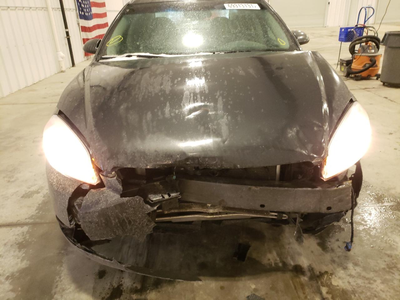 Photo 9 from auction – 2012 CHEVROLET IMPALA LTZ with VIN 2G1WC5E3XC1303354