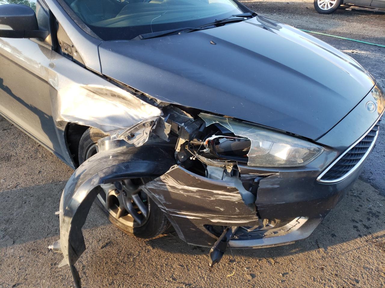 Photo 9 from auction – 2015 FORD FOCUS SE with VIN 1FADP3F27FL297871