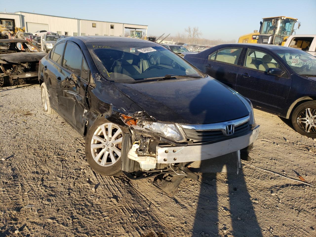 HONDA CIVIC EXL 2012 with VIN 2HGFB2F98CH545886 - Photo from auction