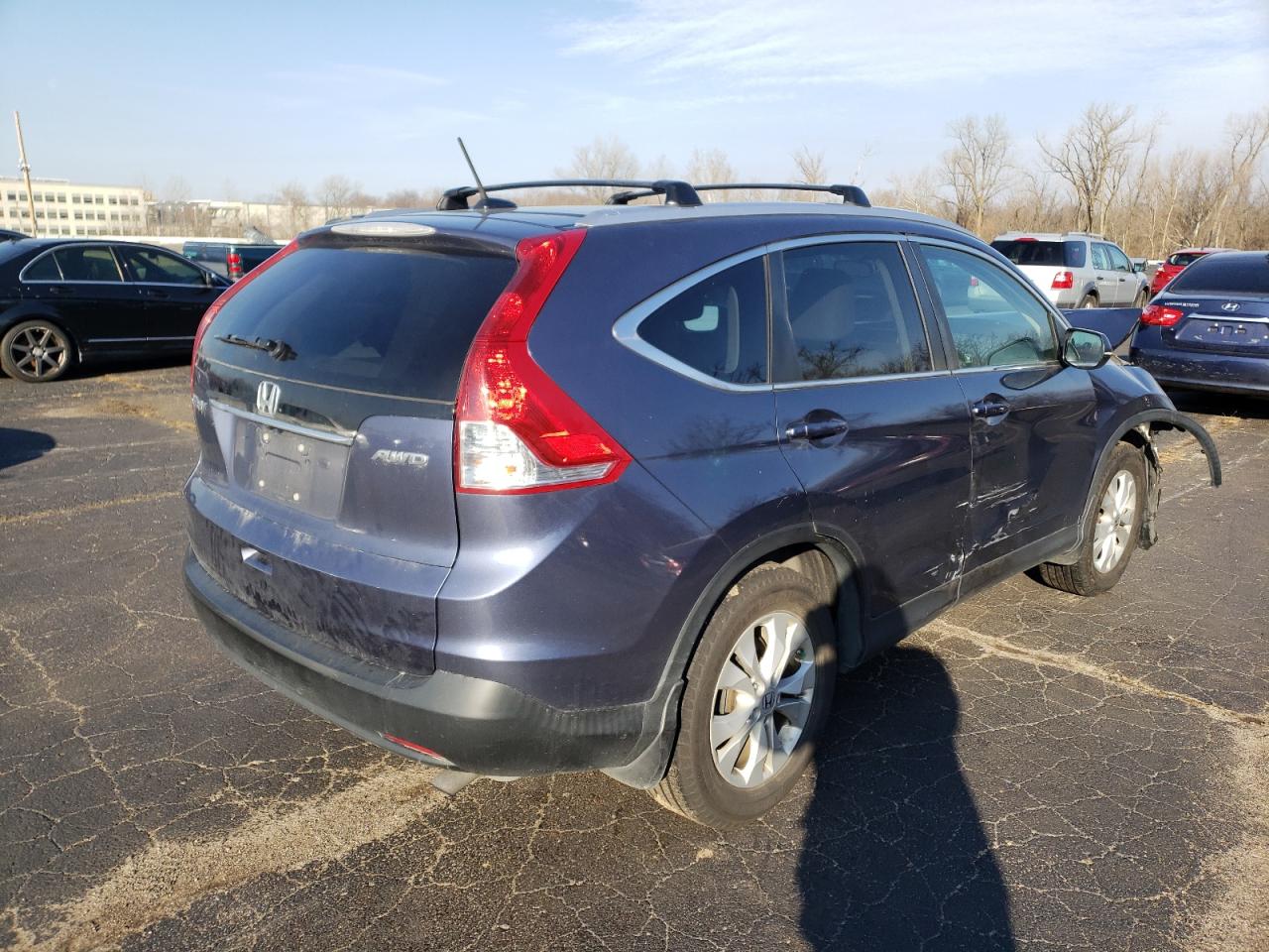 Photo 4 from auction – 2012 HONDA CR-V EXL with VIN 5J6RM4H73CL017327