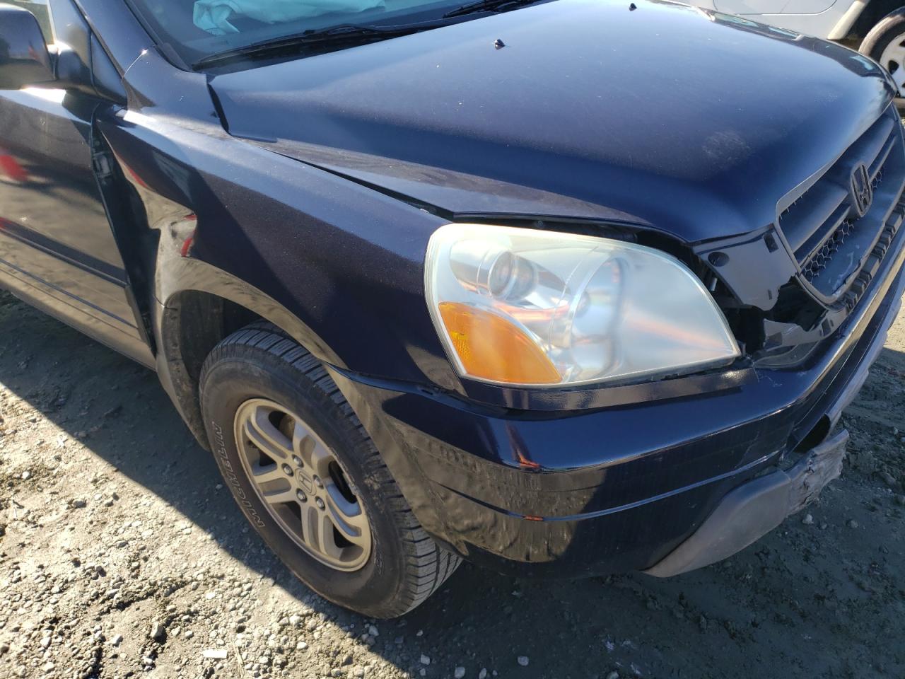 Photo 9 from auction – 2004 HONDA PILOT EXL with VIN 2HKYF18554H529539