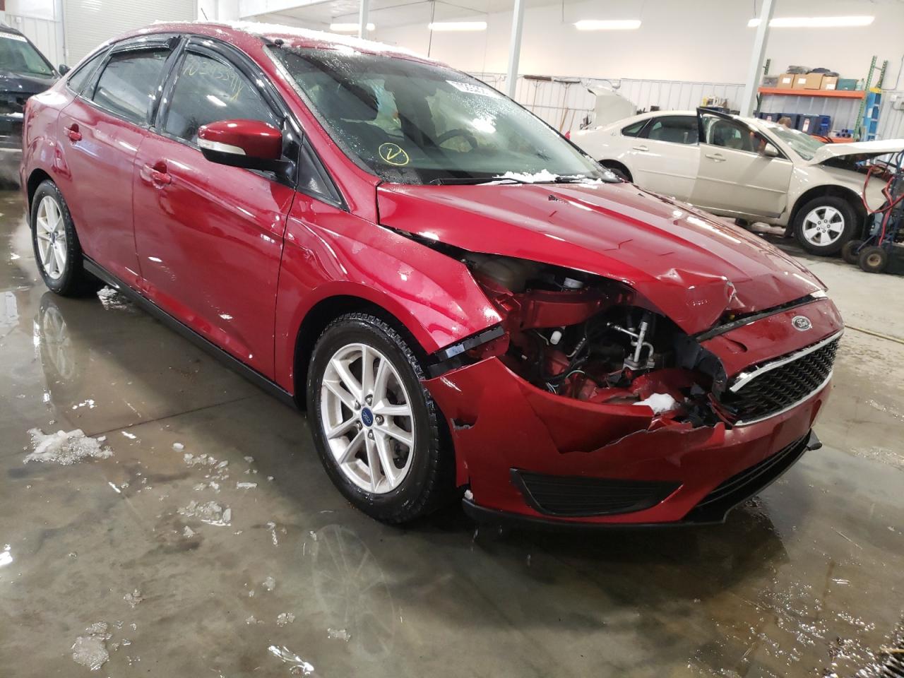 FORD FOCUS SE 2015 with VIN 1FADP3F24FL314335 - Photo from auction