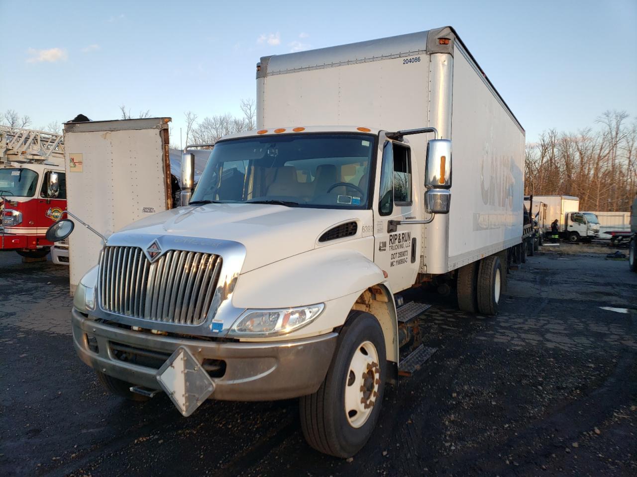Photo 2 from auction – 2003 INTERNATIONAL 4000 4300 with VIN 1HTMMAAN23H595769