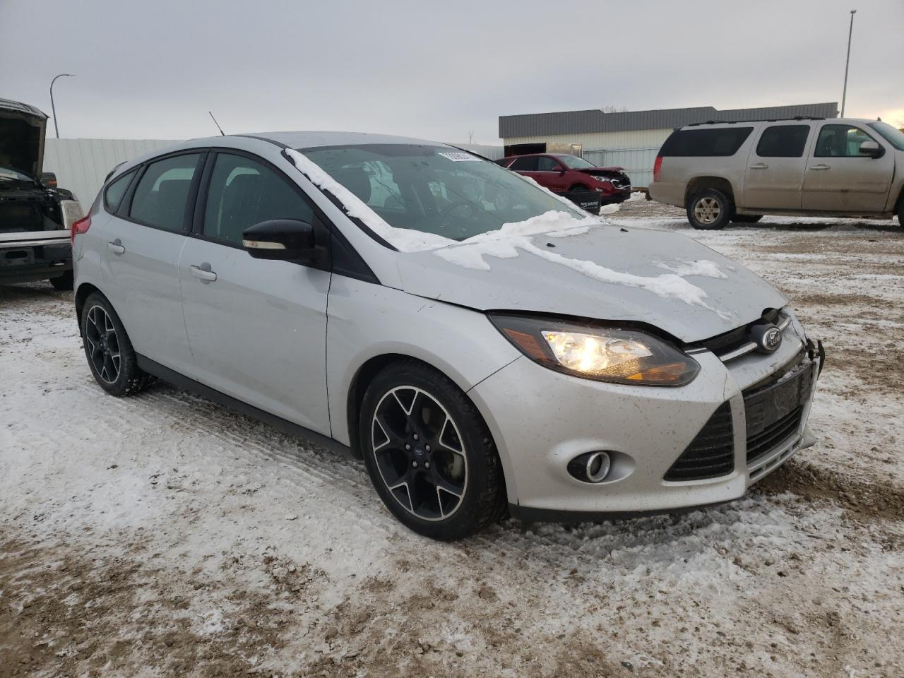 FORD FOCUS SE 2013 with VIN 1FADP3K21DL335064 - Photo from auction