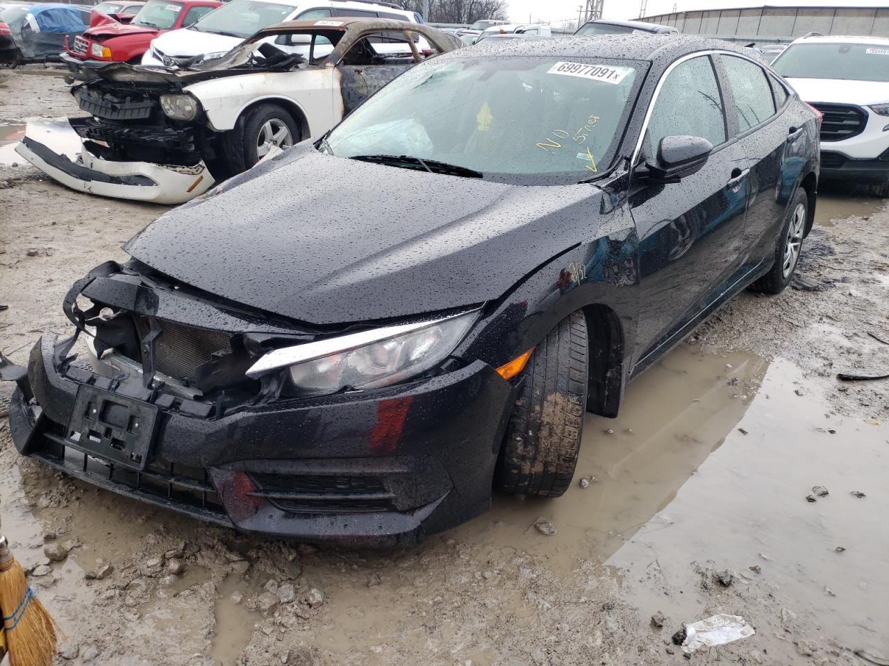 Photo 2 from auction – 2016 HONDA CIVIC LX with VIN 19XFC2F53GE007204