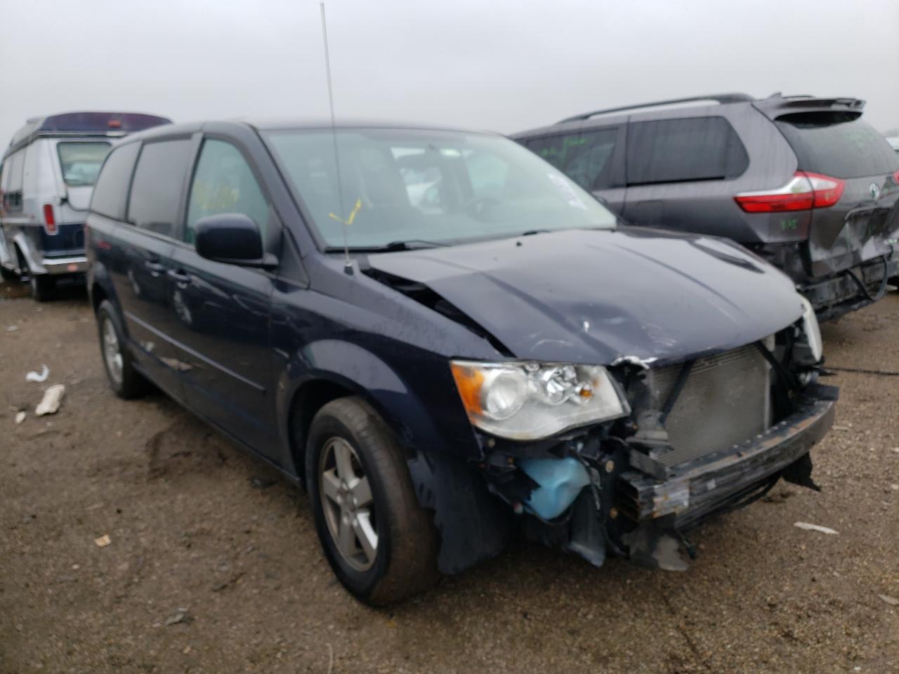 DODGE GRAND CARA 2011 with VIN 2D4RN3DG2BR601424 - Photo from auction