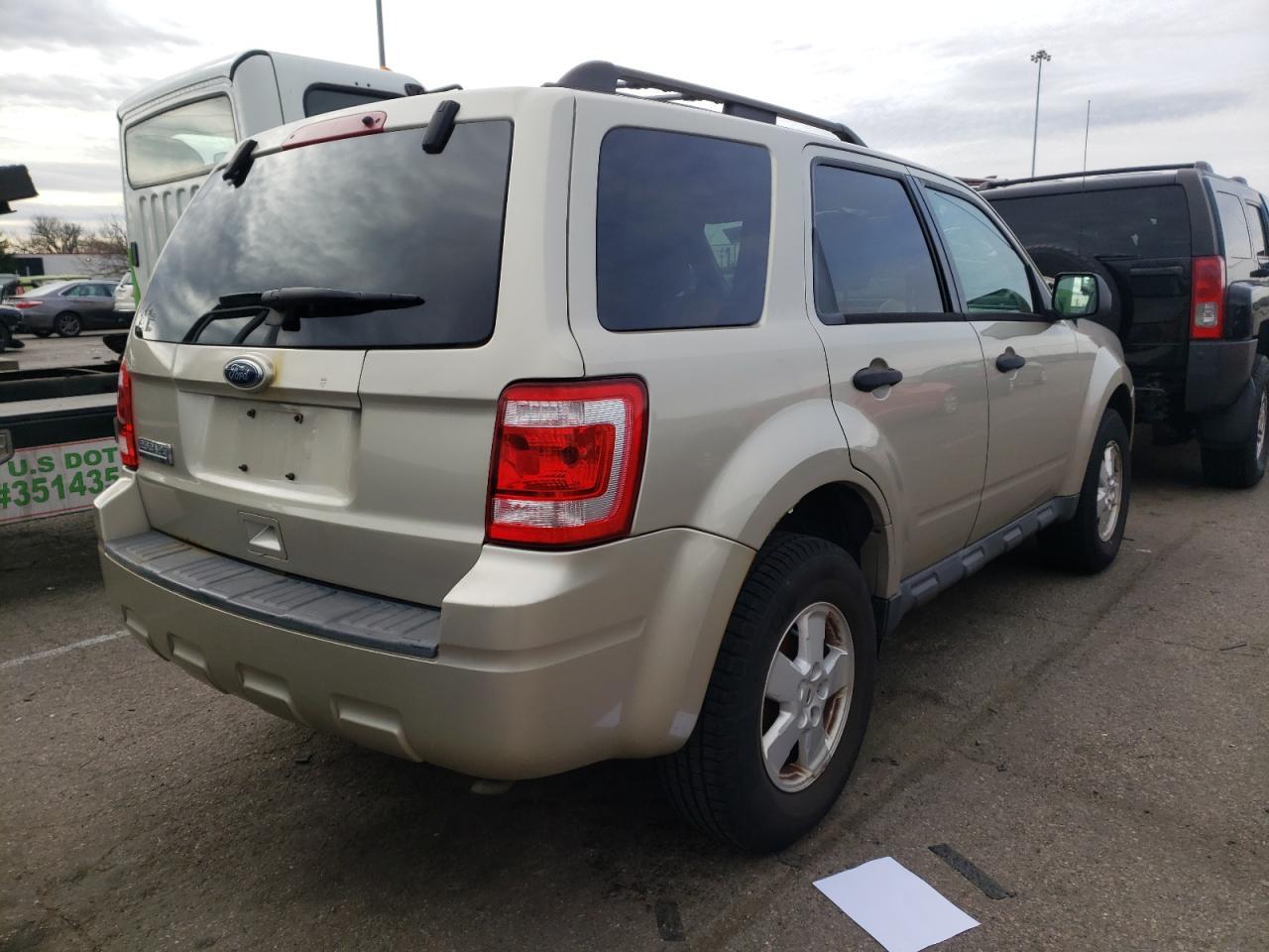 Photo 4 from auction – 2010 FORD ESCAPE XLT with VIN 1FMCU0D72AKB80074