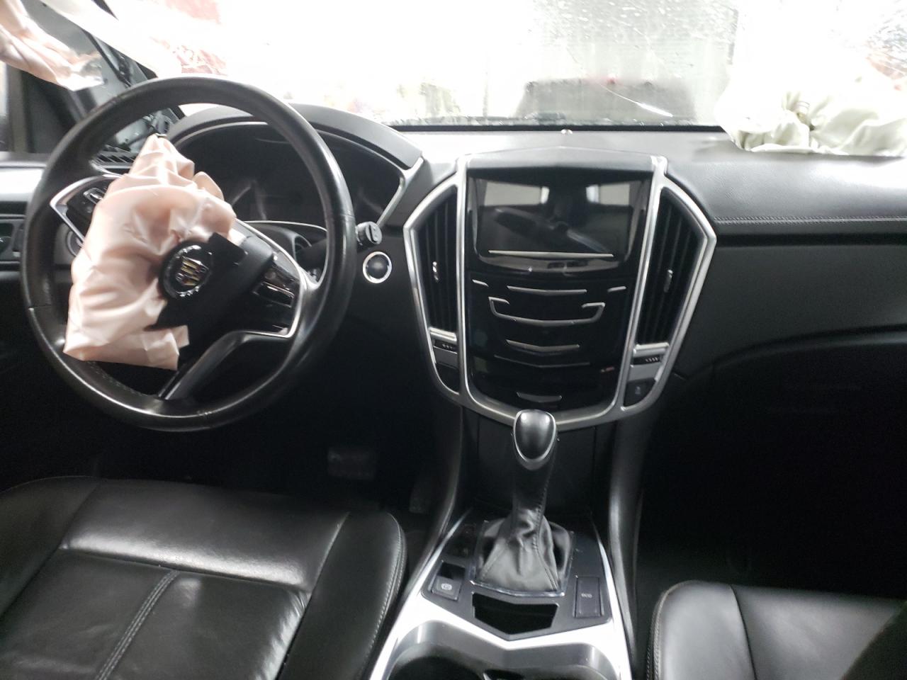 Photo 9 from auction – 2013 CADILLAC SRX with VIN 3GYFNAE39DS650152
