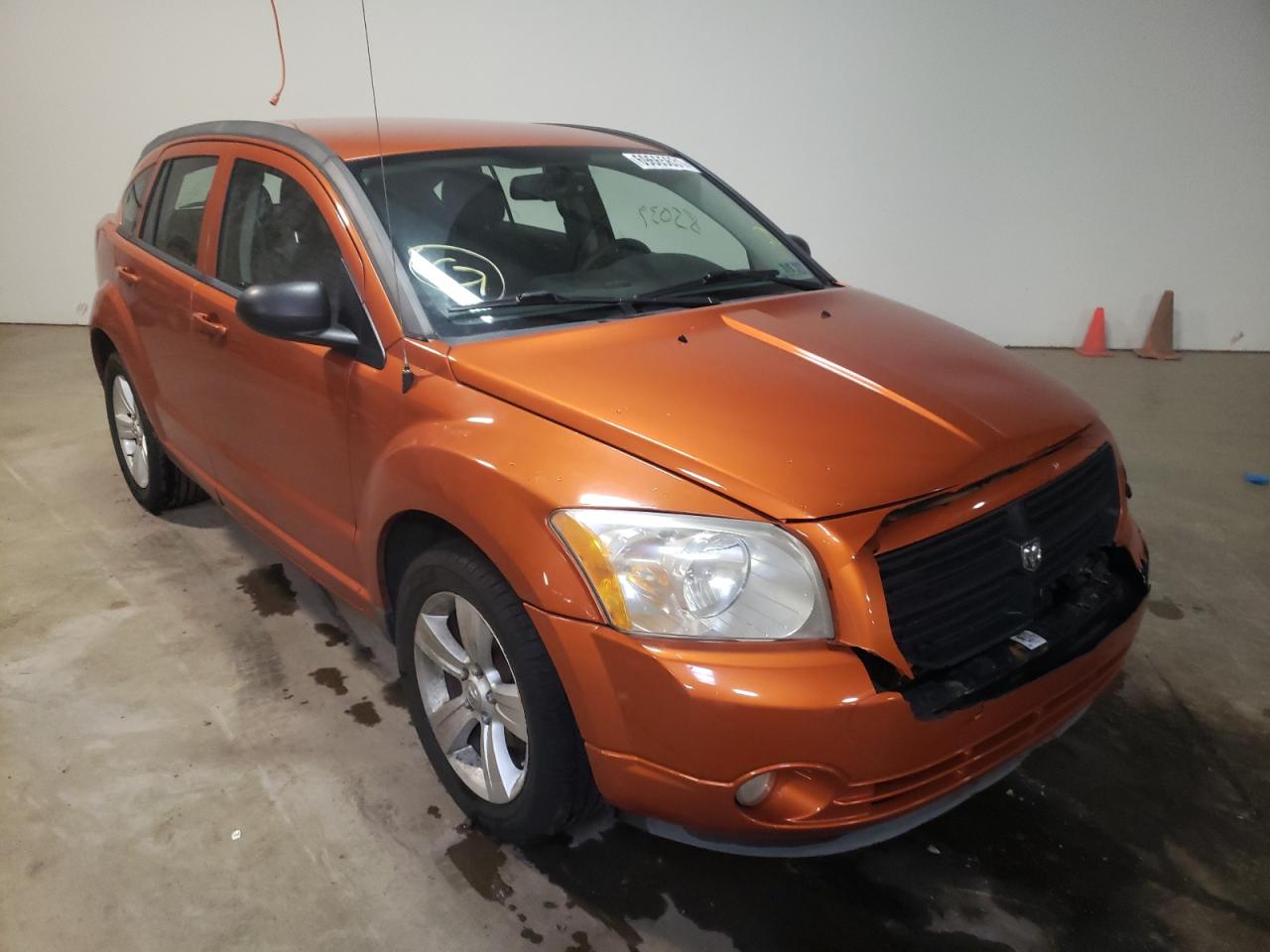 DODGE CALIBER MA 2011 with VIN 1B3CB3HAXBD168540 - Photo from auction