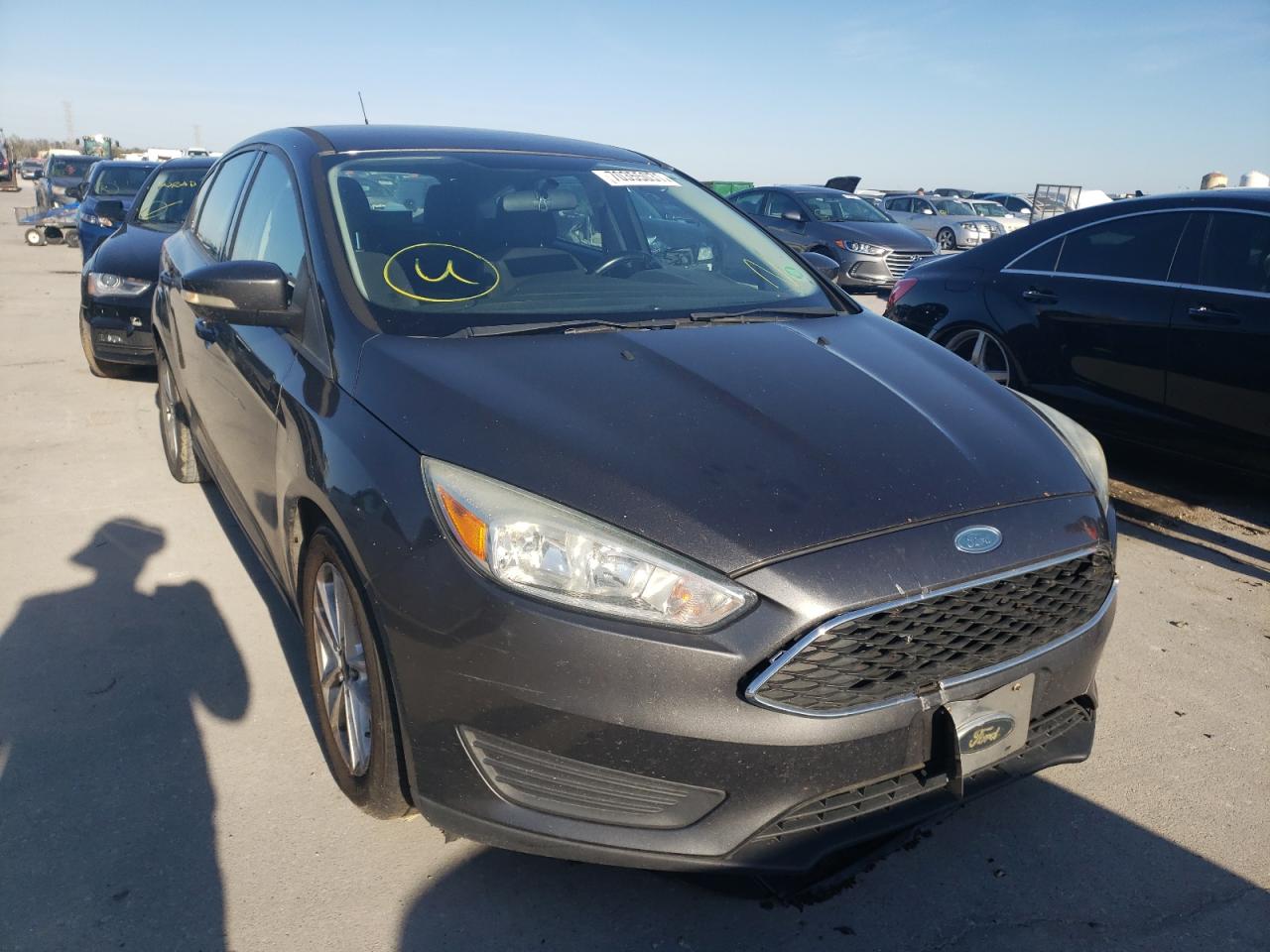 FORD FOCUS SE 2015 with VIN 1FADP3K24FL255339 - Photo from auction