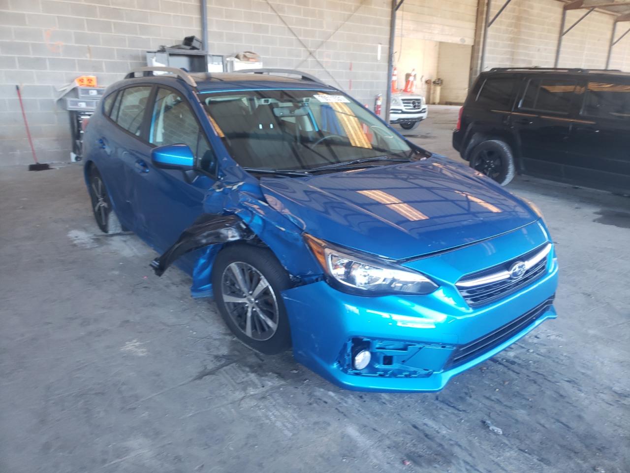 SUBARU IMPREZA PR 2021 with VIN 4S3GTAD66N3704817 - Photo from auction