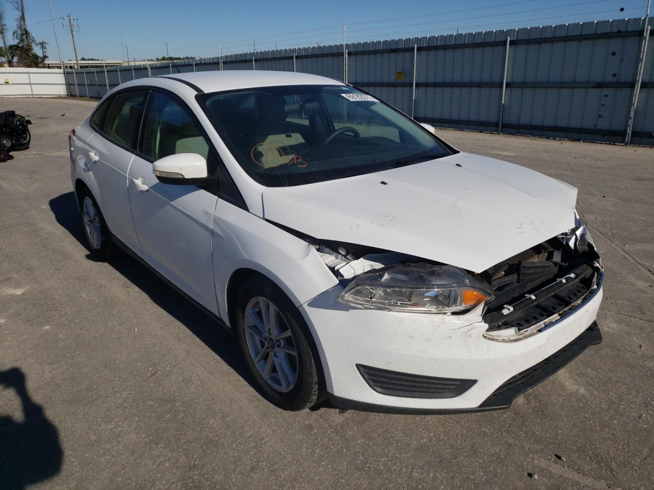 FORD FOCUS SE 2017 with VIN 1FADP3F24HL218417 - Photo from auction