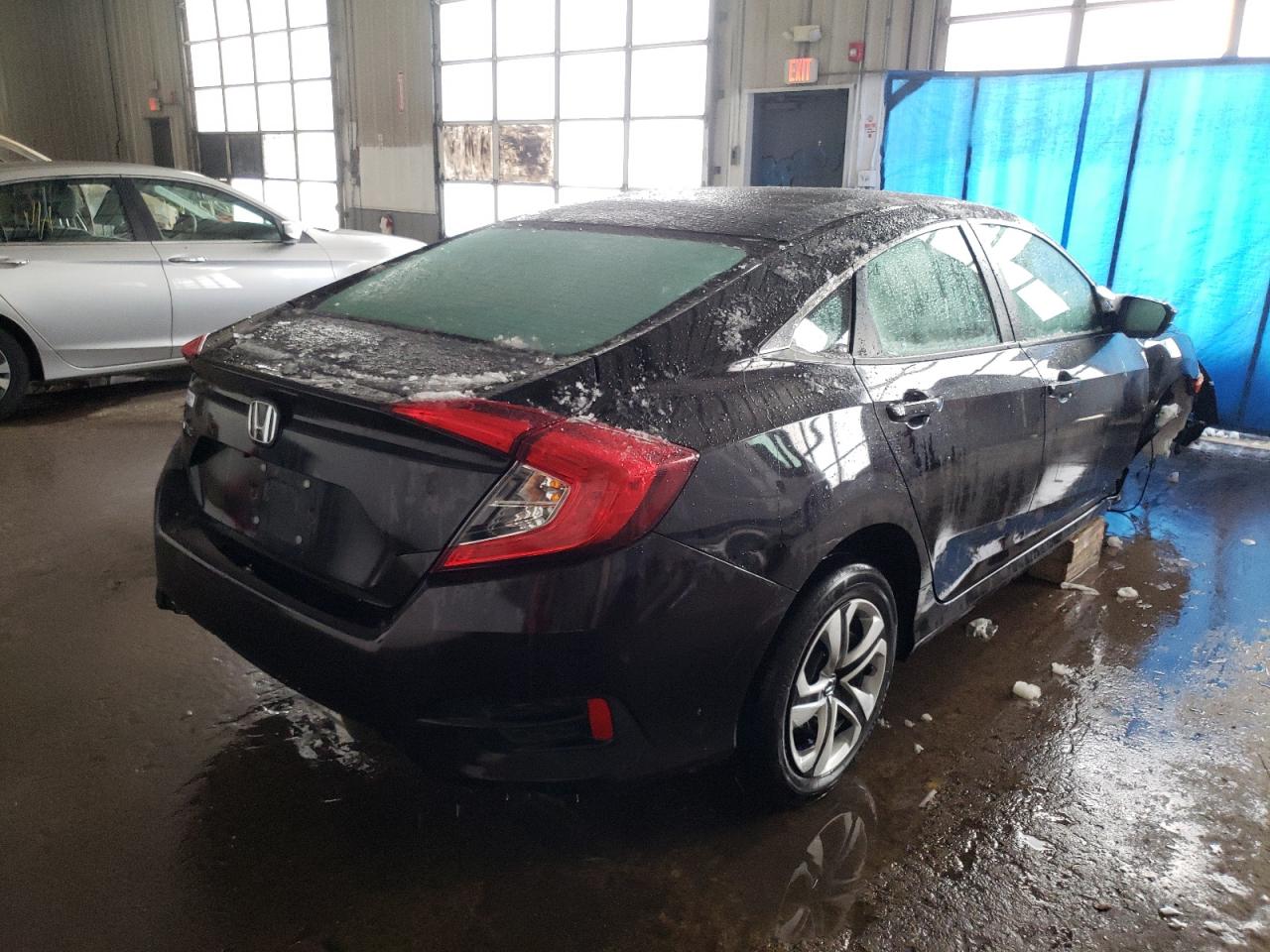 Photo 4 from auction – 2017 HONDA CIVIC LX with VIN 19XFC2F54HE233513