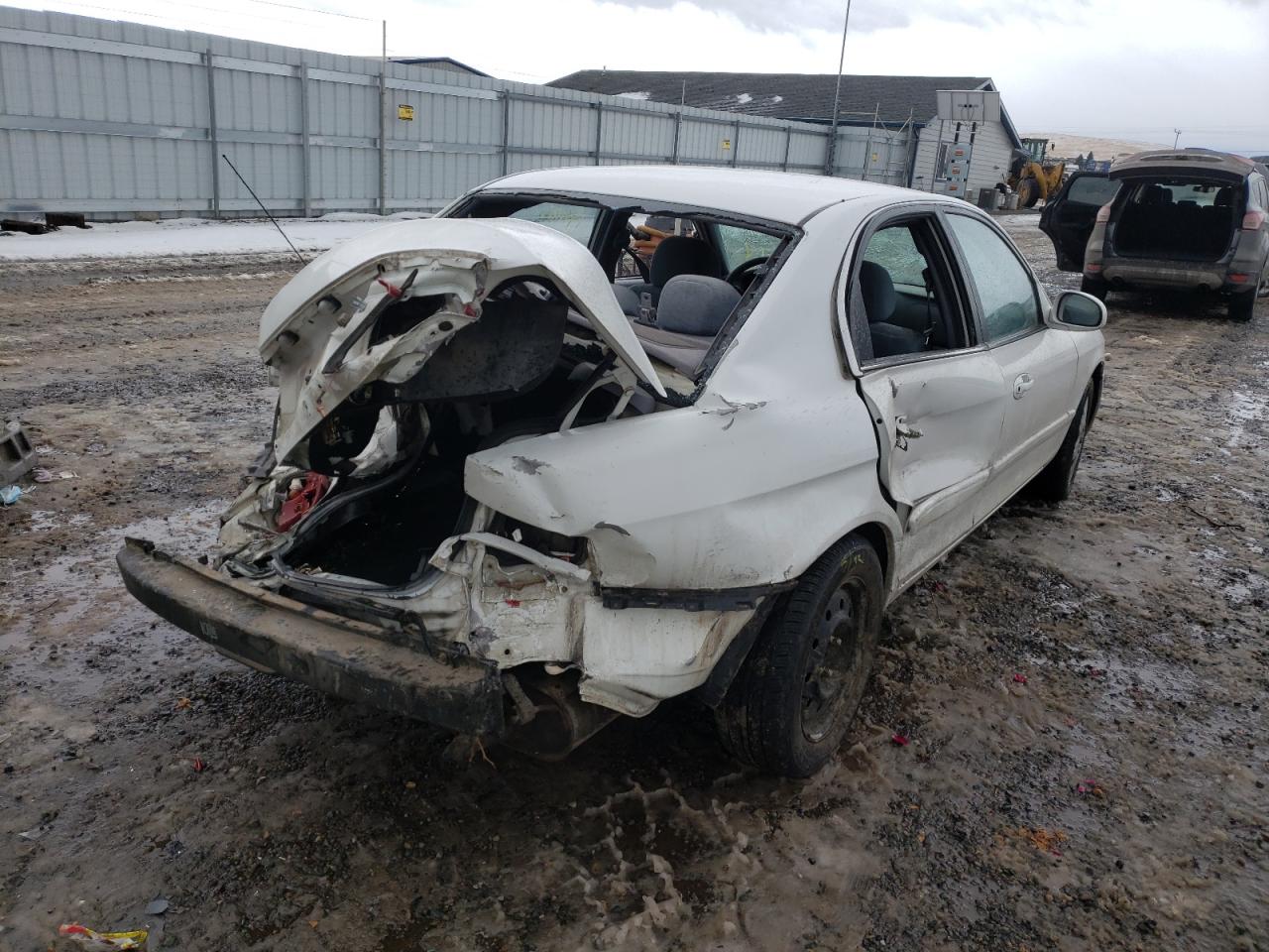 Photo 4 from auction – 2004 KIA OPTIMA LX with VIN KNAGD126745362102